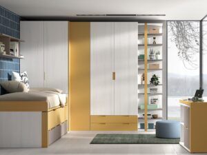 Dormitorio juvenil con mesa giratoria ideal para espacios pequeños y zonas de paso